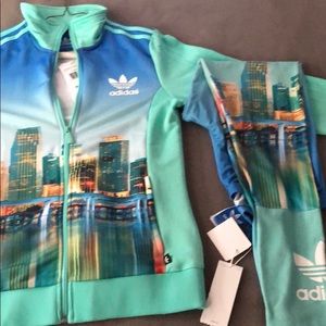 Adidas track suite with leggings.